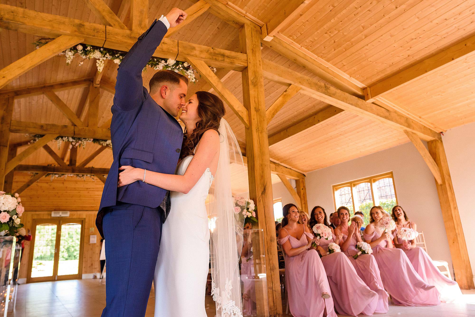 bride and groom first kiss