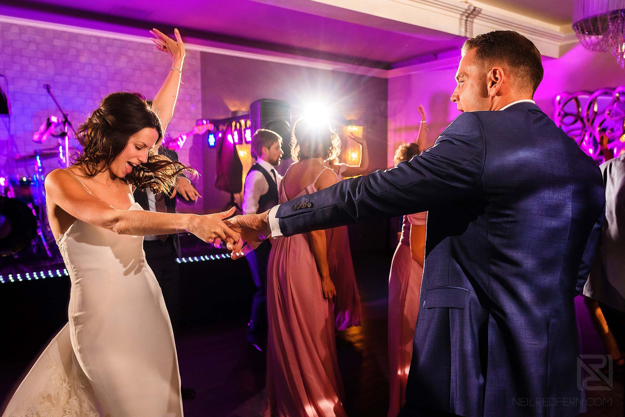 bride and groom dancing