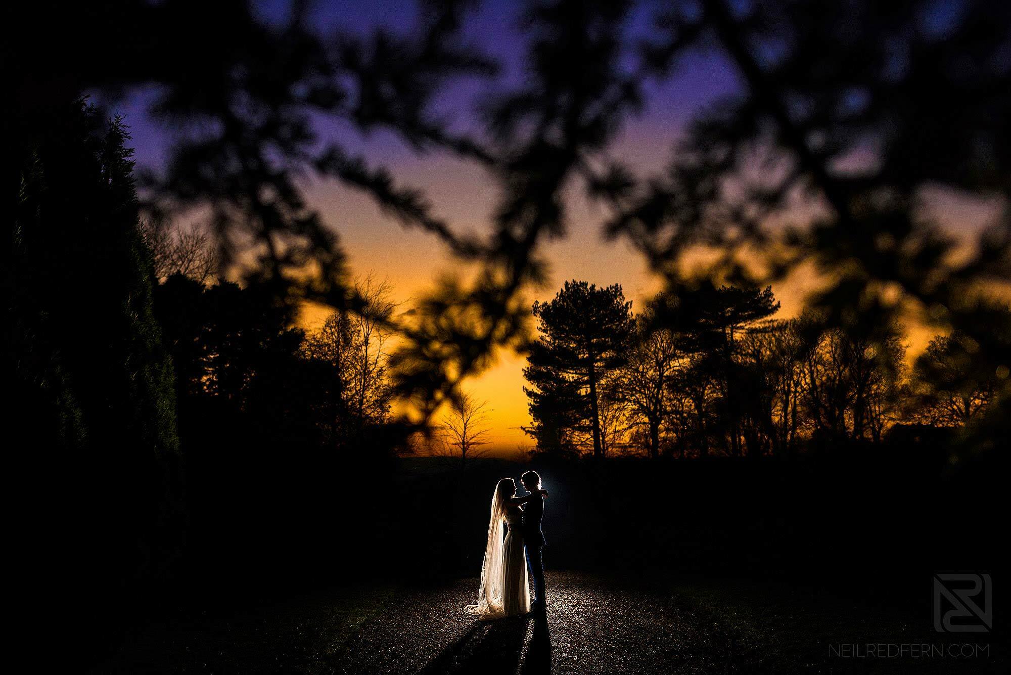 creative portrait of bride and groom at Eaves Hall in Lancashire