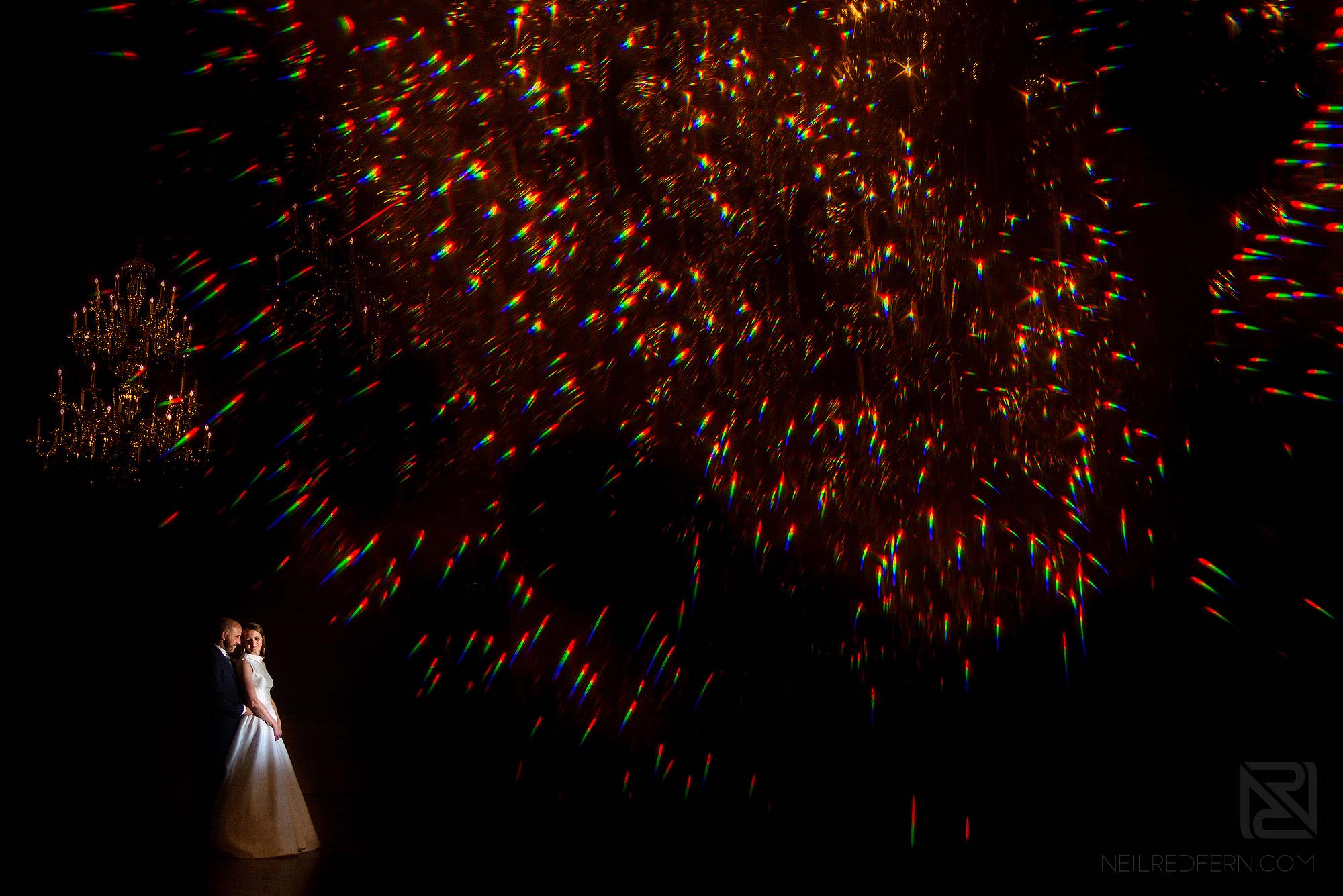 creative photograph of bride and groom using crystal