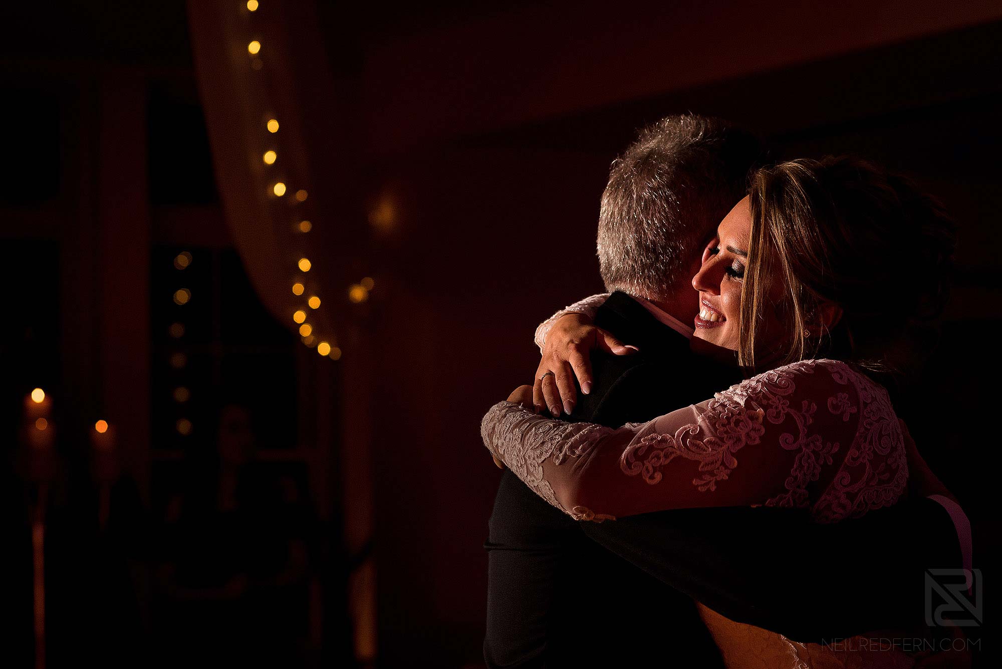 bride hugging dad on the dancefloor at wedding