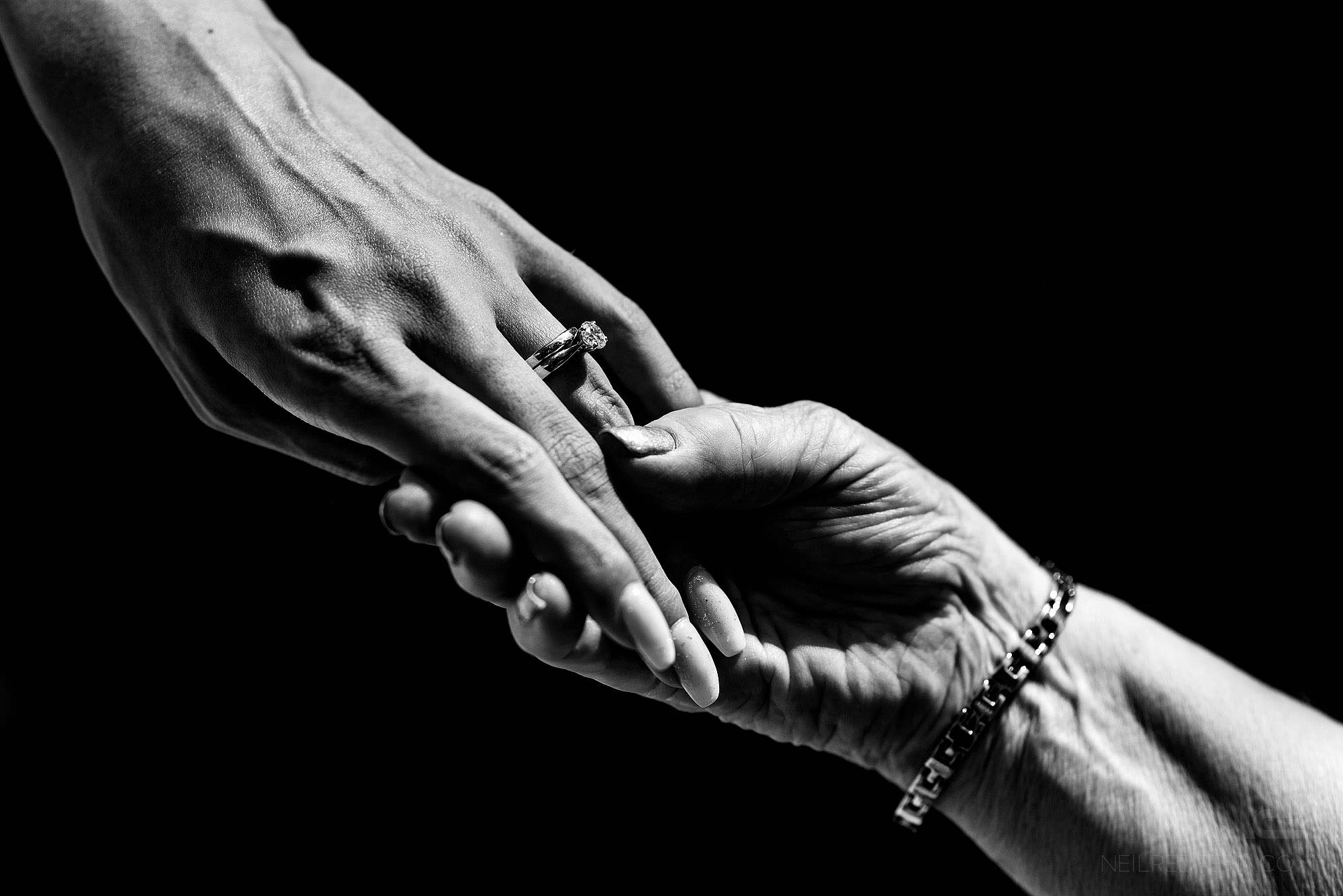 close up of bride's hand with wedding ring