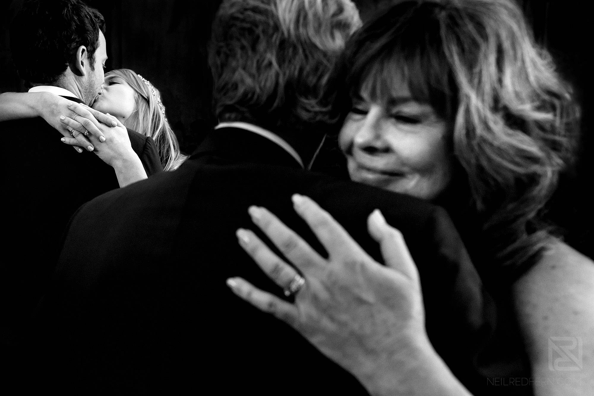 bride and groom first dance with parents
