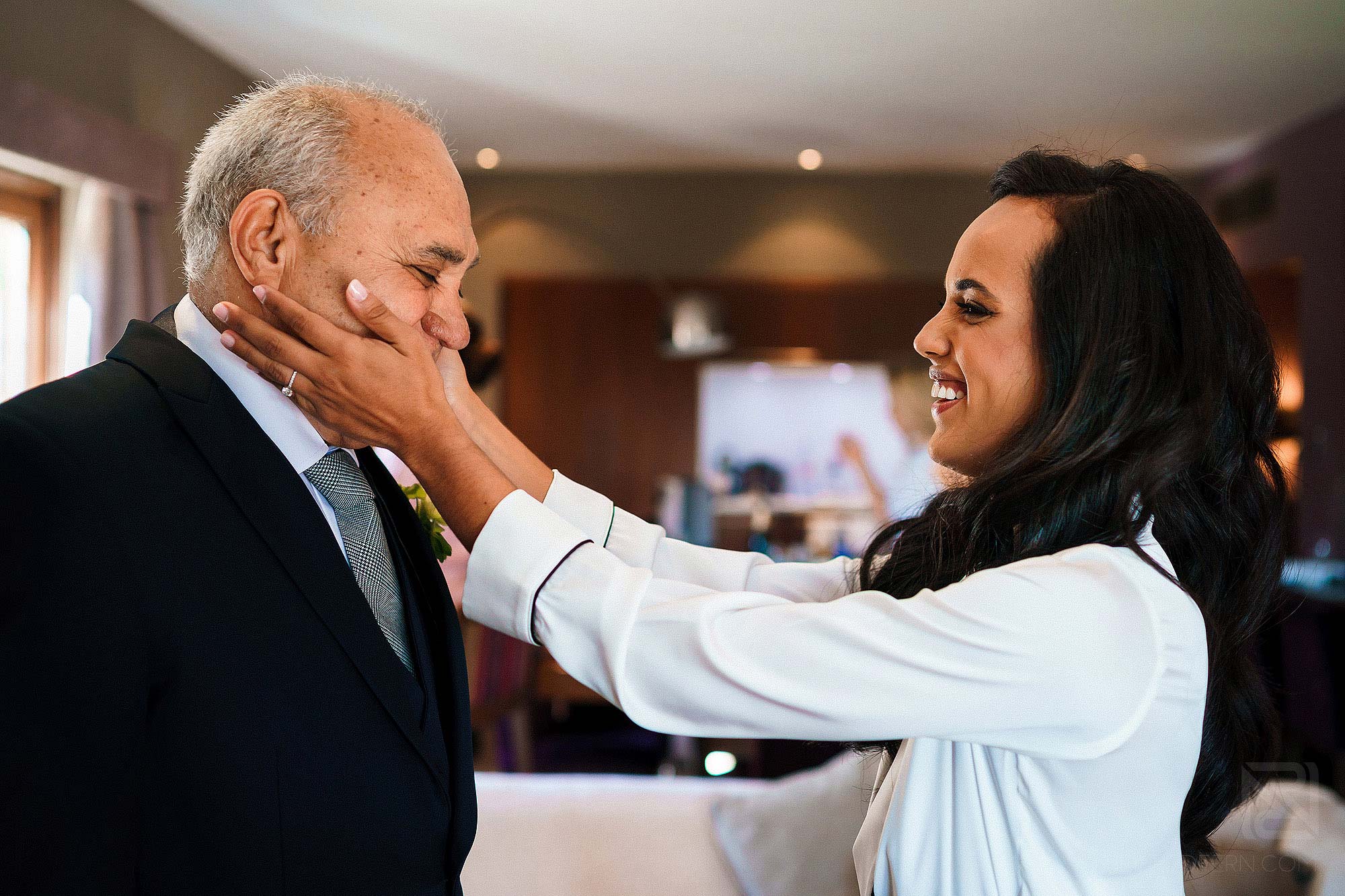 emotional moment between bride and father