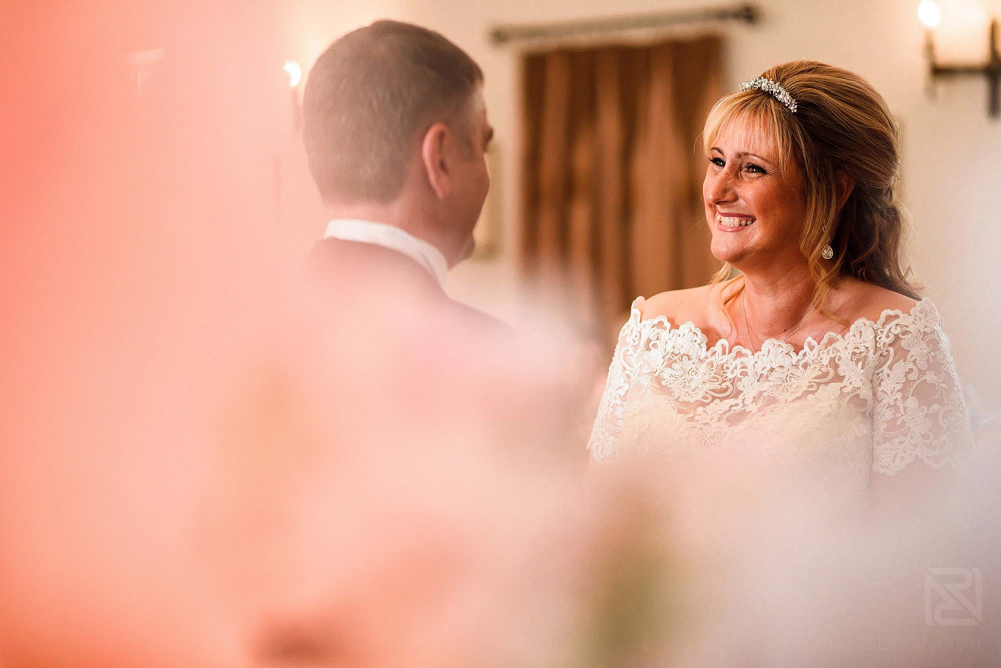 bride and groom looking at each other during wedding ceremony at The Villa Wrea Green 