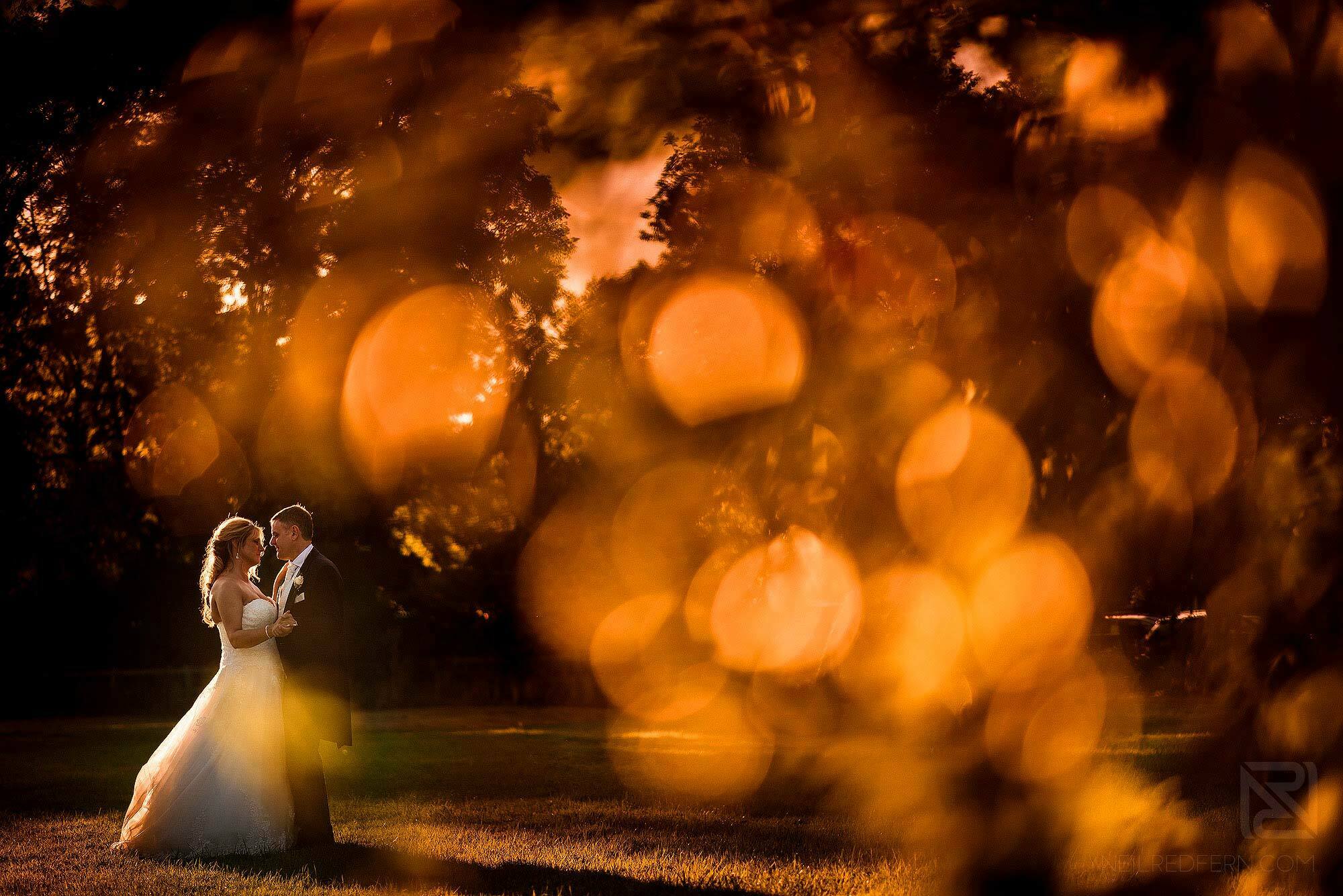 golden hour portrait of newlyweds at The Villa Wrea Green in Lancashire
