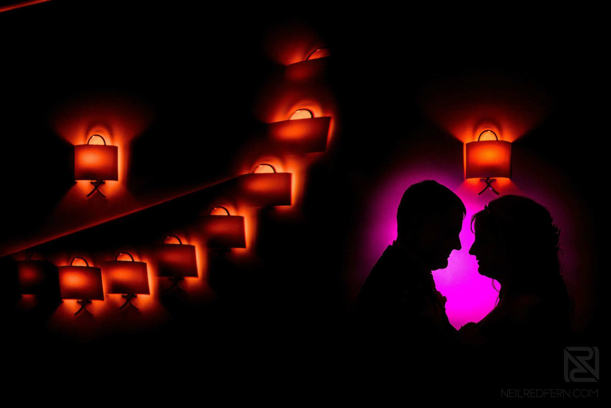 creative off camera flash portrait of bride and groom