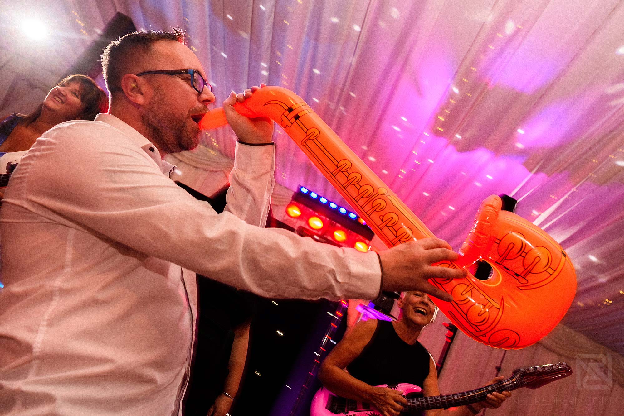 wedding guest playing saxophone on the danceloor at The Villa Wrea Green 