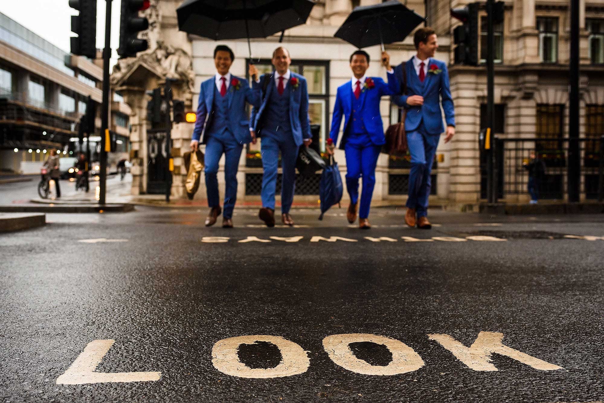 groom and best men crossing the road in London