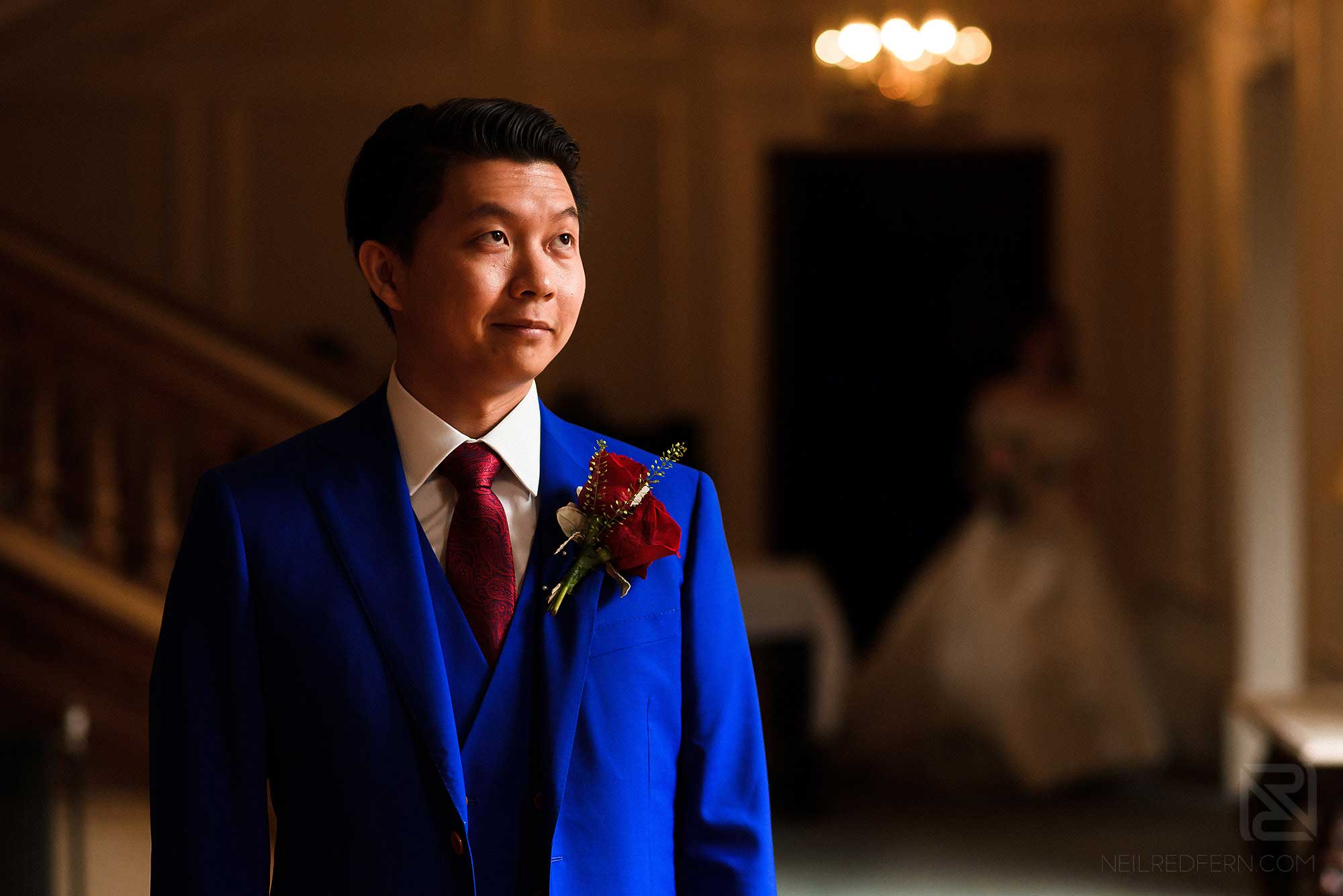 groom looking nervous before first look