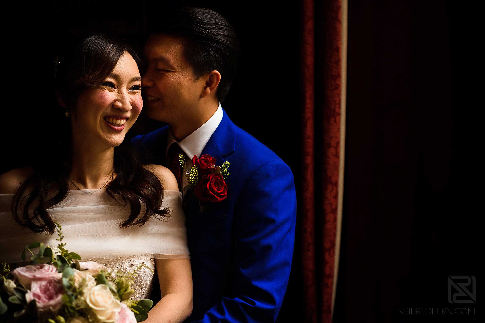 close up photograph of bride and groom together