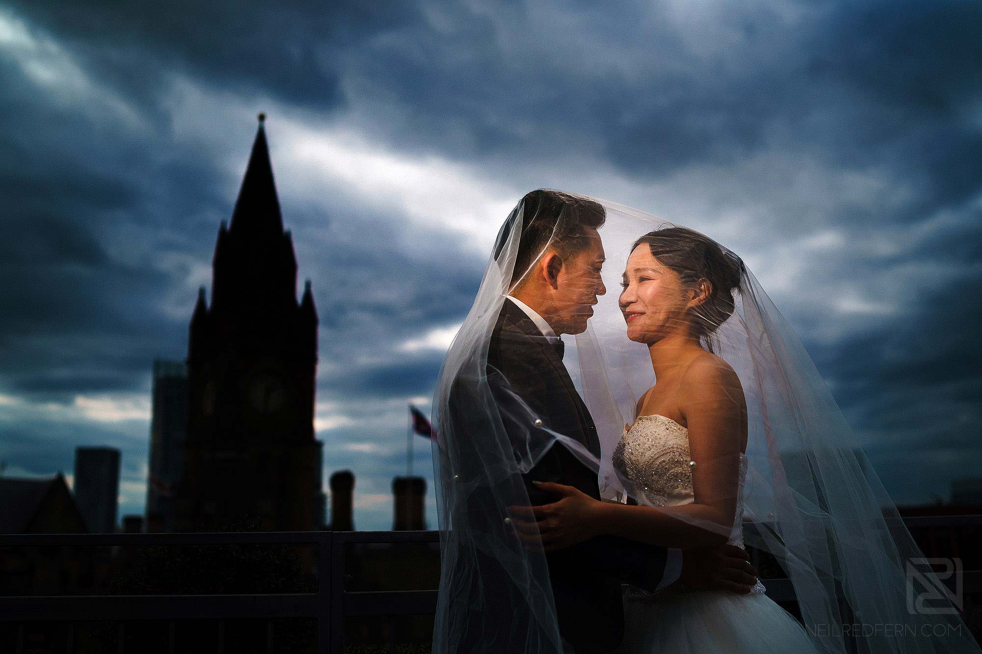bride and groom portrait in front of Manchester Town Hall