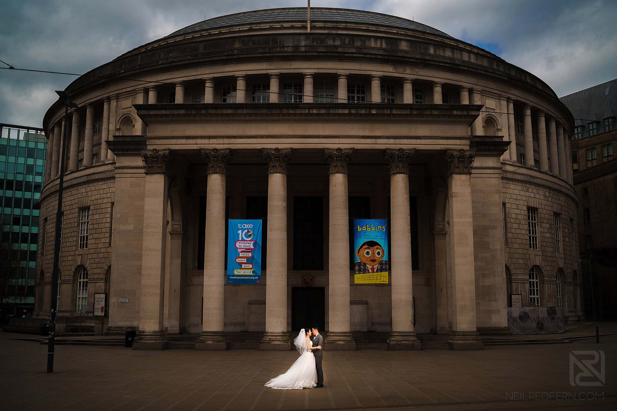bride and groom outside Central Library in Manchester