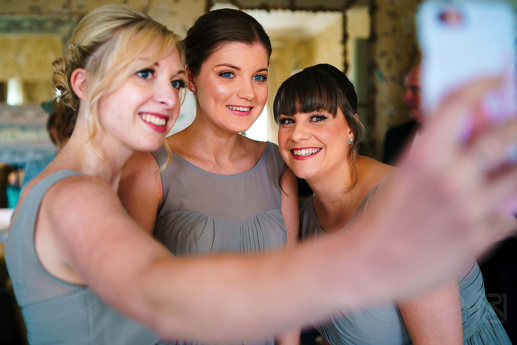 bridesmaids taking a selfie
