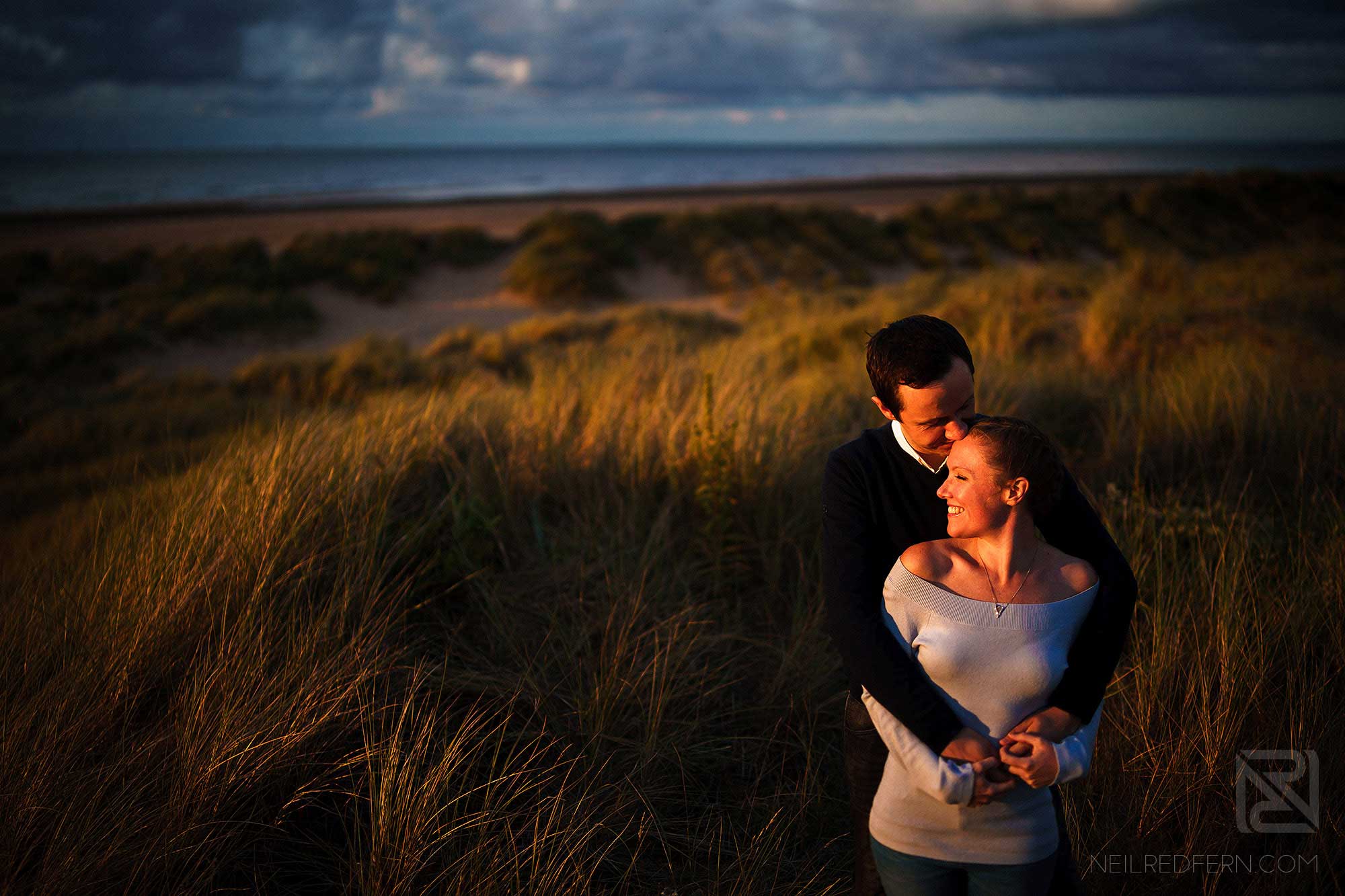 Family and couple portrait shoots 5 happy couple at sunset on the beach